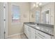 Bathroom featuring white cabinets with granite countertops at 1436 30Th N Ave, St Petersburg, FL 33704