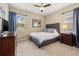 Bedroom with neutral decor, ceiling fan, and ample natural light at 1436 30Th N Ave, St Petersburg, FL 33704