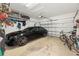Spacious garage featuring ample storage racks and parking for car and bikes at 1436 30Th N Ave, St Petersburg, FL 33704