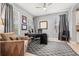 Spacious home office with neutral walls, ample natural light, and comfortable seating at 1436 30Th N Ave, St Petersburg, FL 33704