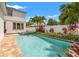 Gorgeous pool and spa area with lush landscaping and privacy fence at 1436 30Th N Ave, St Petersburg, FL 33704