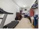 Spacious walk-in closet with shelving, rods and a dresser for ample storage and organization at 1436 30Th N Ave, St Petersburg, FL 33704