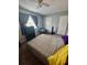 Bedroom with a neutral color scheme and natural light at 144 Douglas W Rd # F, Oldsmar, FL 34677
