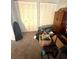 Carpeted room with louvered closet doors at 144 Douglas W Rd # F, Oldsmar, FL 34677