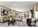 Bright living room with stylish furniture, neutral colors, and an open floor plan at 14807 Summer Branch Dr, Lithia, FL 33547