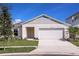 Charming single-Gathering home with well-manicured lawn and attached two-car garage at 14815 Summer Branch Dr, Lithia, FL 33547