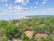An aerial view of the property showcasing its proximity to the water at 160 Sage Cir, Crystal Beach, FL 34681
