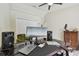Bedroom with ceiling fan, wood floors, and closet at 160 Sage Cir, Crystal Beach, FL 34681