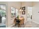 Cozy dining area by the pool featuring tile floors, neutral walls, and natural light at 160 Sage Cir, Crystal Beach, FL 34681