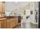 The kitchen area connects seamlessly with the dining area, offering a functional cooking space and open floorplan at 160 Sage Cir, Crystal Beach, FL 34681