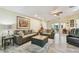 Charming living room flows into the outdoor space, offering a seamless transition for indoor-outdoor living at 160 Sage Cir, Crystal Beach, FL 34681