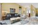 Inviting living room with a view to the front door and light yellow paint at 160 Sage Cir, Crystal Beach, FL 34681