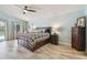 Spacious main bedroom featuring a large bed, ample natural light, and a serene atmosphere at 160 Sage Cir, Crystal Beach, FL 34681