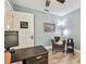 Cozy office space with desk and a comfortable chair offering an efficient and inviting workspace at 160 Sage Cir, Crystal Beach, FL 34681