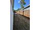 Spacious backyard featuring a patio area and secure fencing for privacy at 1778 New Hampshire Ne Ave, St Petersburg, FL 33703