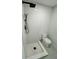 Modern bathroom with a white tile shower, sleek fixtures, and a contemporary design at 1778 New Hampshire Ne Ave, St Petersburg, FL 33703