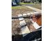 Walkway leading to the front door with decorative landscaping at 1778 New Hampshire Ne Ave, St Petersburg, FL 33703