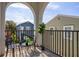 Comfortable outdoor balcony area showcasing a bistro set and views of the neighborhood at 2110 W Azeele St, Tampa, FL 33606