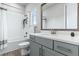 Clean bathroom featuring a modern vanity with white countertops and a shower-tub combo with white subway tiles at 2110 W Azeele St, Tampa, FL 33606