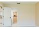 A view from the bedroom to the open kitchen and the ensuite bathroom at 2211 Bay Berry Ln, Clearwater, FL 33763