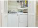 Convenient laundry closet equipped with a modern washer and dryer at 2211 Bay Berry Ln, Clearwater, FL 33763