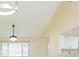 Open living room featuring modern lighting, high ceilings, and a bright, airy atmosphere at 2211 Bay Berry Ln, Clearwater, FL 33763