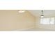 Bright living room with modern lighting and a large window at 2211 Bay Berry Ln, Clearwater, FL 33763
