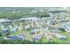 Overhead perspective of a single-Gathering home in a peaceful, pond-front community with lush landscaping at 2214 132Nd E Pl, Parrish, FL 34219