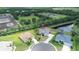 Overhead shot of the single-Gathering house with a screened-in lanai by a pond in a peaceful community at 2214 132Nd E Pl, Parrish, FL 34219