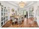 Elegant dining room with hardwood floors and a decorative chandelier at 2214 132Nd E Pl, Parrish, FL 34219