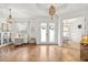 Bright living space featuring hardwood floors, and stylish decor, creating a cozy and inviting atmosphere at 2214 132Nd E Pl, Parrish, FL 34219