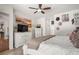 Another view of the main bedroom with light wood floors and white accents at 2214 132Nd E Pl, Parrish, FL 34219