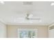 A bright bedroom features recessed lights and a white ceiling fan at 2421 Lake Point Ln, Clearwater, FL 33762