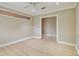 Neutral bedroom featuring new flooring and trim at 2421 Lake Point Ln, Clearwater, FL 33762