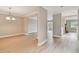 Open dining room with adjacent rooms offering airy, connected living spaces at 2421 Lake Point Ln, Clearwater, FL 33762