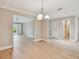 Spacious living room featuring bright connecting rooms at 2421 Lake Point Ln, Clearwater, FL 33762
