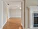 Living room with fireplace and hardwood floors at 2421 Lake Point Ln, Clearwater, FL 33762