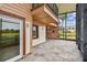 Enjoy this tiled patio with direct access to the golf course and pond view, perfect for relaxation at 2421 Lake Point Ln, Clearwater, FL 33762