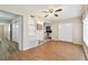 Bedroom featuring laminate floors and a large closet at 2469 Franciscan Dr # 59, Clearwater, FL 33763