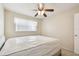 Bedroom with carpet and a bright window at 2469 Franciscan Dr # 59, Clearwater, FL 33763