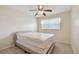 Comfortable bedroom with neutral colors and carpet at 2469 Franciscan Dr # 59, Clearwater, FL 33763
