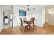 Cozy dining area with a round table and wooden chairs at 2469 Franciscan Dr # 59, Clearwater, FL 33763