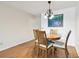 Dining area with a round table and wooden chairs at 2469 Franciscan Dr # 59, Clearwater, FL 33763