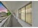 Exterior hallway with well-maintained walkway and easy access to multiple units and common areas at 2469 Franciscan Dr # 59, Clearwater, FL 33763