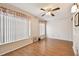 Bright living room with laminate floors and large windows at 2469 Franciscan Dr # 59, Clearwater, FL 33763