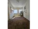 Utility space with water heater and multiple windows at 2510 Queen S St, St Petersburg, FL 33712