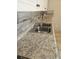 Close up of a kitchen countertop with laminate and a stainless steel sink at 2510 Queen S St, St Petersburg, FL 33712