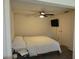 Cozy bedroom featuring a ceiling fan and a mounted television for relaxation at 2701 47Th N Ave, St Petersburg, FL 33714