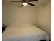 A simple bedroom that features a ceiling fan and large white bed at 2701 47Th N Ave, St Petersburg, FL 33714