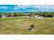 Aerial view of community baseball field with shaded spectator area and mature trees at 2811 Barret Ave, Plant City, FL 33566
